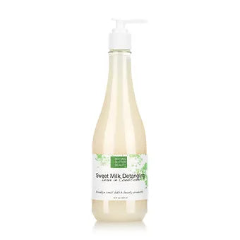 Brown Butter Beauty Detangling Leave-In Conditioner bottle on a white background, designed to reduce frizz and improve wet combing