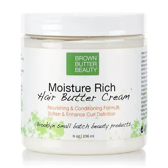 Brown Butter Beauty Hair Butter Cream on a white surface, perfect for softening, moisturizing, and enhancing curl definition for twist-outs and braids